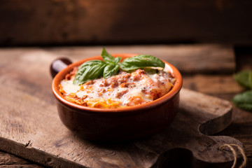 Lasagna dish on a rustic table