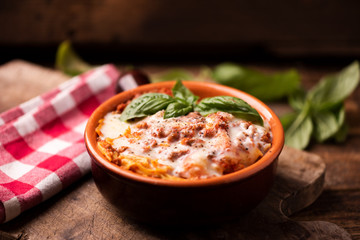 Lasagna dish on a rustic table