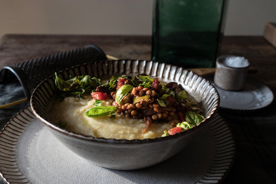 Polenta with vegetarian ragout served in bowl