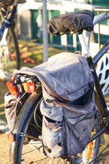 Close up of traditional old canvas panniers on a bicycle