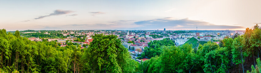 Fototapeta na wymiar Cityscape skyline view on famous Old and New Town of Vilnius from Three Crosses Hill panoramic viewpoint
