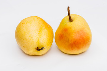 Two organic pears on the white background