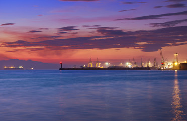 Cranes at the harbor at sunset, Thessaloniki, Greece.