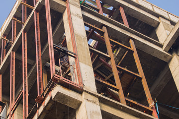 The work of the fearless welder at a height without insurance.Welder work at a height in the...
