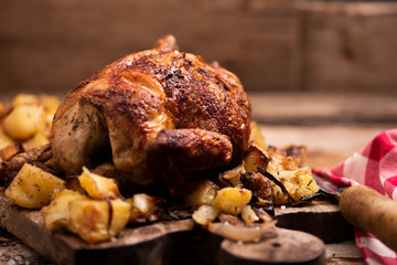  Whole roasted chicken on a cutting board
