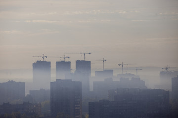 Fototapeta na wymiar Multi-storey building. Morning panorama of the big city. High-rise buildings