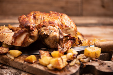  Whole roasted chicken on a cutting board
