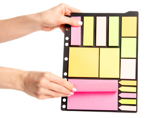 Colorful notes paper in hand on white background isolation