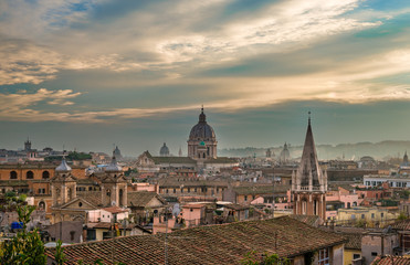 Fototapeta na wymiar The skyline of Rome, seen from Viale Gabriele D'Annunzio, in the evening.