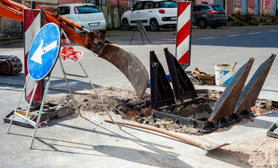 mini excavator equipped with a very narrow bucket to perform excavations of small width in the...