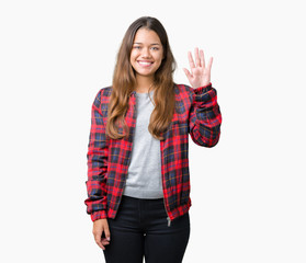 Young beautiful brunette woman wearing a jacket over isolated background showing and pointing up with fingers number five while smiling confident and happy.