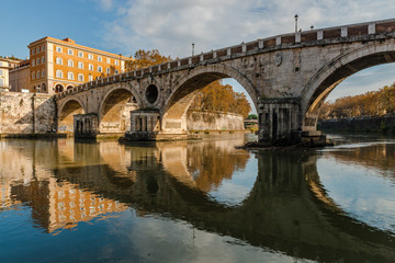 Obraz na płótnie Canvas View of Ponte Sisto in the winter. Ponte Sisto is a pedestrian medieval bridge in the historic centre of Rome, that spans the river Tiber. Rome, Italy, December 2018.