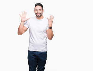 Young man wearing casual white t-shirt over isolated background showing and pointing up with fingers number nine while smiling confident and happy.