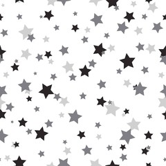 Seamless abstract pattern with little sharp black and grey stars on white background.
