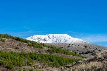 Fototapeta na wymiar Snowy mountain top on sunny day