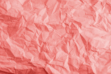 Fototapeta premium Crumpled Paper Background Texture in Coral