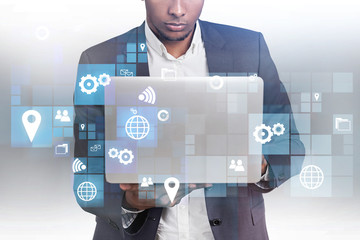 African American man, laptop, business interface