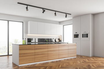 White kitchen corner with island