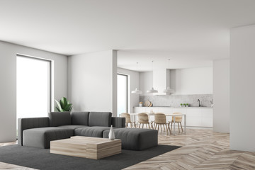 Corner of white living room and kitchen