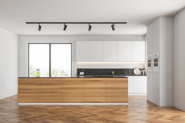 White kitchen with wooden island