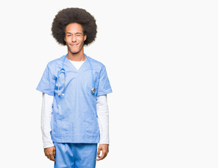 Young african american doctor man with afro hair winking looking at the camera with sexy...