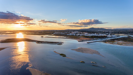 Aerial. Delightful sunset over the Portuguese village Fuzeta, Tavira.