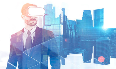 Businessman in vr glasses in blue city