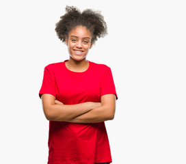 Fototapeta na wymiar Young afro american woman over isolated background happy face smiling with crossed arms looking at the camera. Positive person.