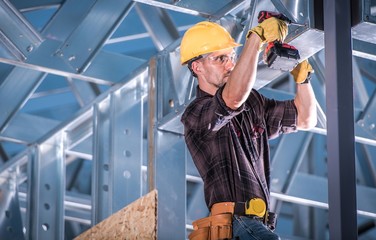 Worker on the Building Frame