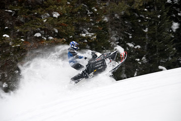 Busting Snow on Snowmobiles
