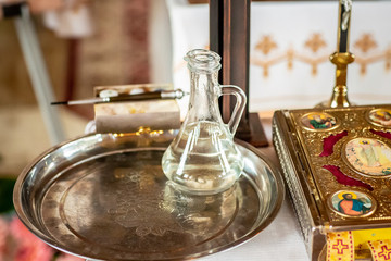 baptismal font and jug. tools for church baptism