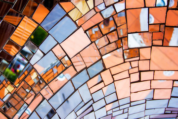 mosaic mirror pieces on a sculpture