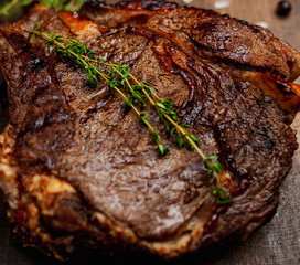 steak on a wooden board, closeup