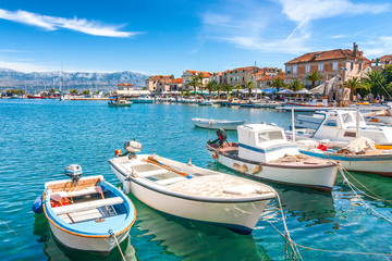 Fototapeta na wymiar Boats in the Supetar harbor on the Brac island at a summer, Croatia, Europe.