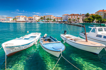 Fototapeta na wymiar Boats in the Supetar harbor on the Brac island at a summer, Croatia, Europe.