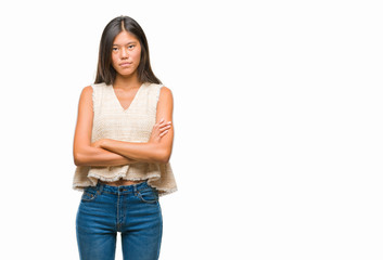 Young asian woman over isolated background skeptic and nervous, disapproving expression on face...
