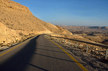 Empty car road in Negev desert near Big crater,Israel,Middle East
