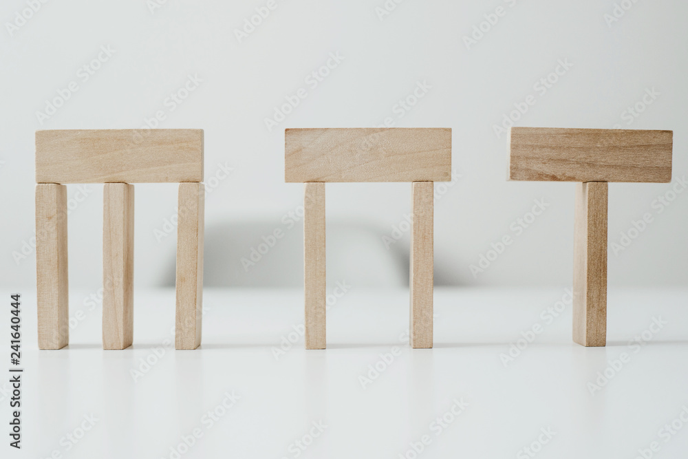 Poster stacked empty wooden blocks. content completion concept, blocks based on different pillars.