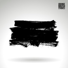 Black brush stroke and texture. Grunge vector abstract hand - painted element. Underline and border design.