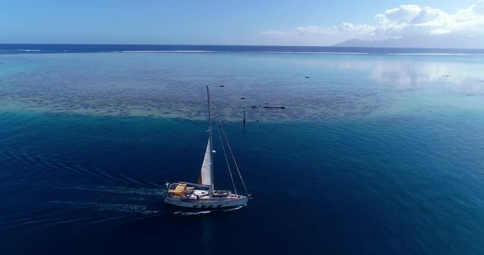 sailboat in a lagoon in aerial view, Papeete French Polynesia