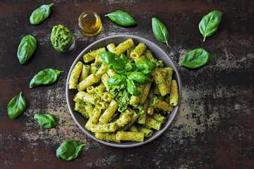 Delicious homemade pesto pasta. Colorful healthy vegan bowl.