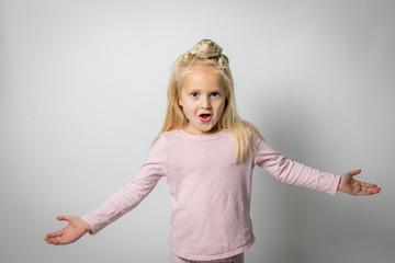 Cute Little Girl with Bearded Dragon Lizard on Head