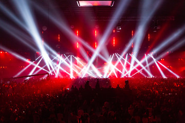 Fototapeta na wymiar Stage illuminated by beautiful rays of lighting equipment.
