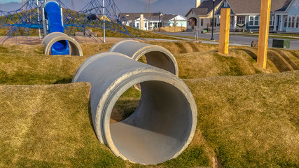 Concrete tunnels for play in playground for kids