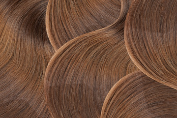 Natural brown hair as abstract background. High resolution