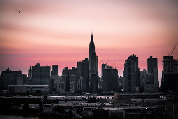 Fototapeta na wymiar New York city skyline urban Williamsburg bridge sunset