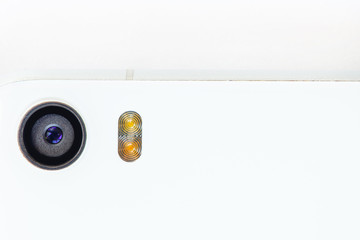 back camera and flash of a white glass smartphone, macro