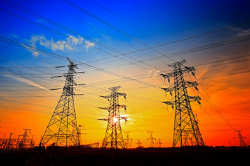 Electric tower, silhouette at sunset