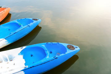 Colorful kayaks on the tropical lake