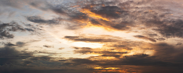 Naklejka na ściany i meble Dramatic sunset clouds on sky